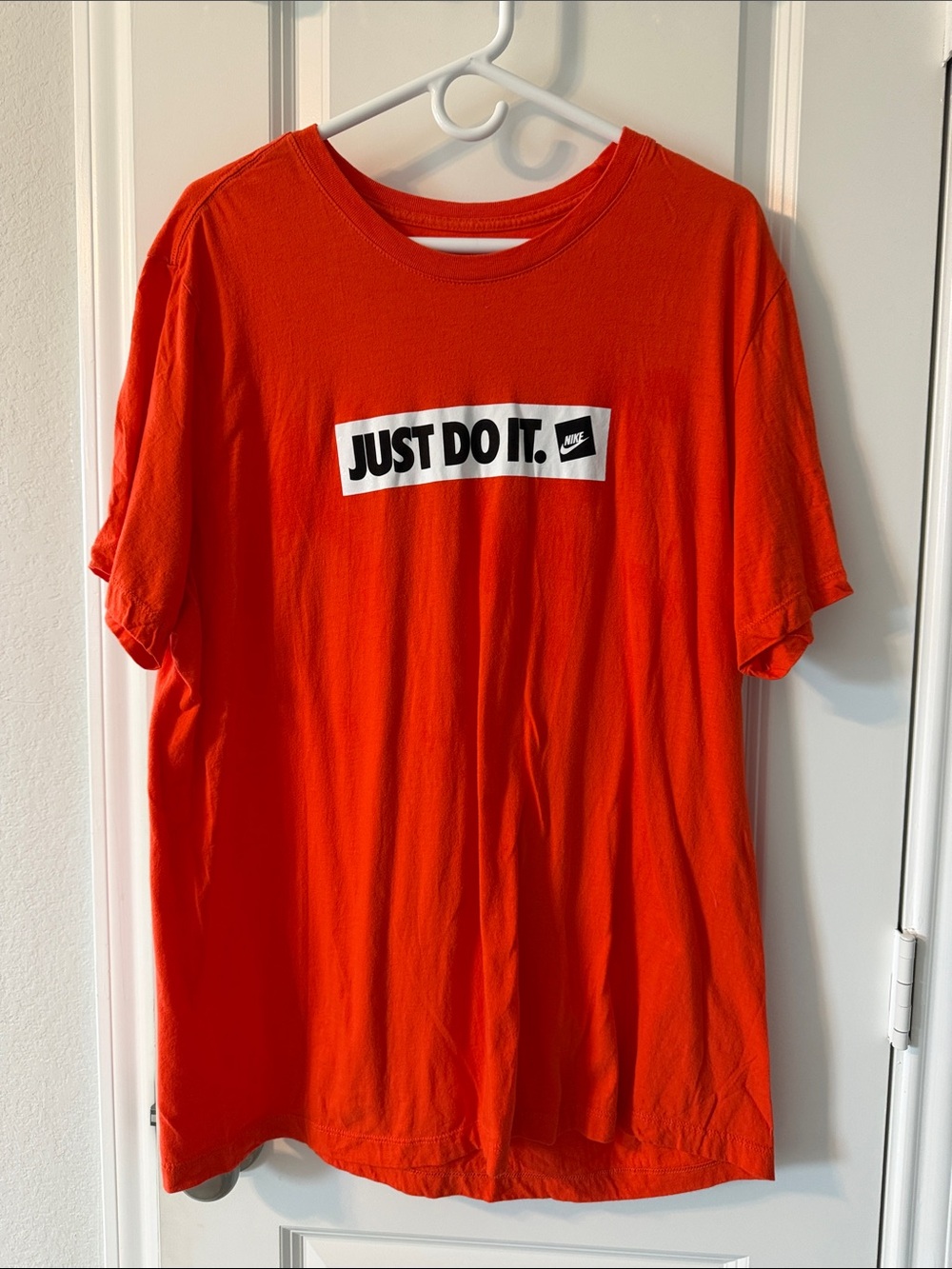 Nike Orange Short-Sleeve Tee with 'Just Do It.' Graphic